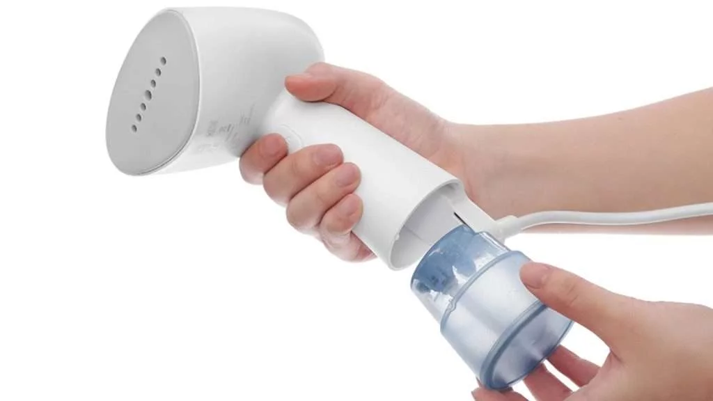 Bàn ủi hơi nước cầm tay Philips STH1000 - Bình chứa nước 85ml