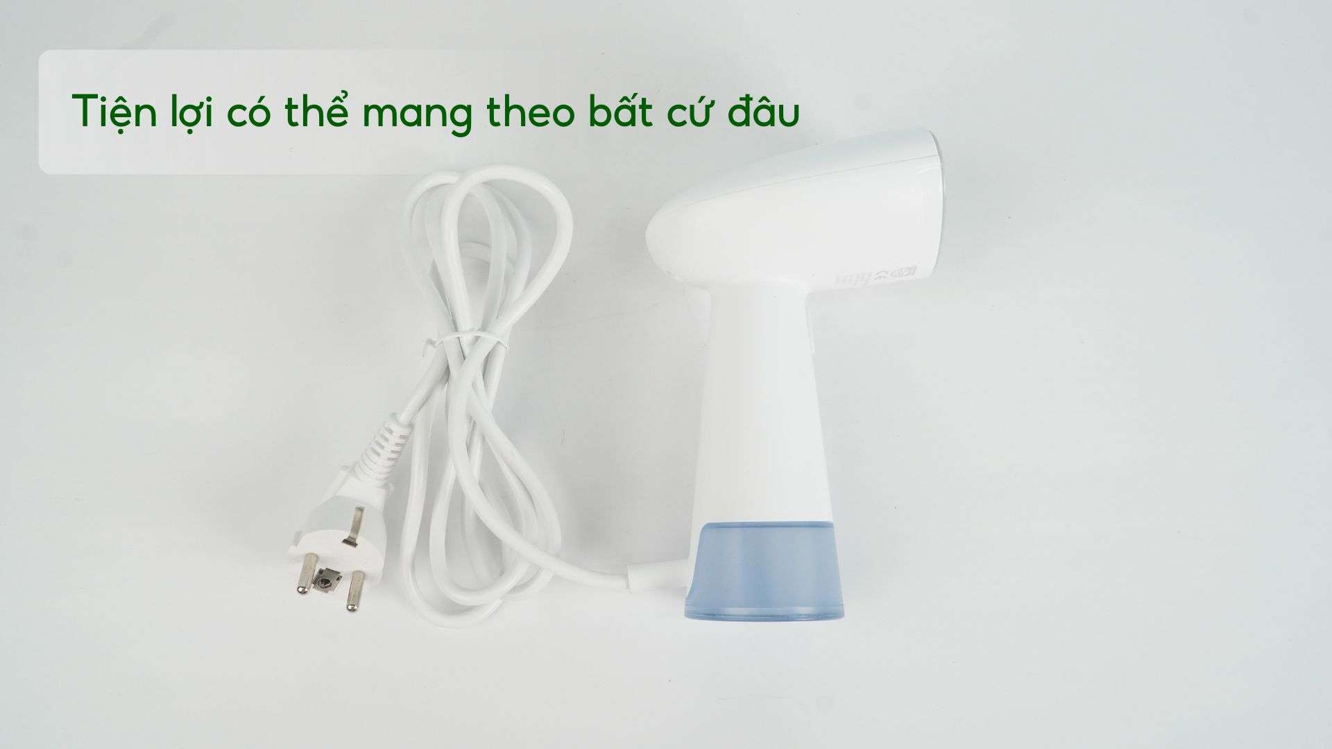Bàn ủi hơi nước cầm tay Philips STH1000_10_Trắng và xanh dương Tiện lợi có thể mang theo bất cứ đâu
