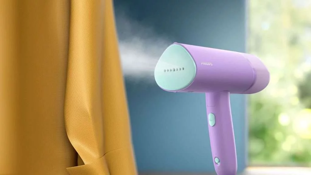 Bàn ủi hơi nước cầm tay Philips STH3010 Tím - Hình ảnh thực tế