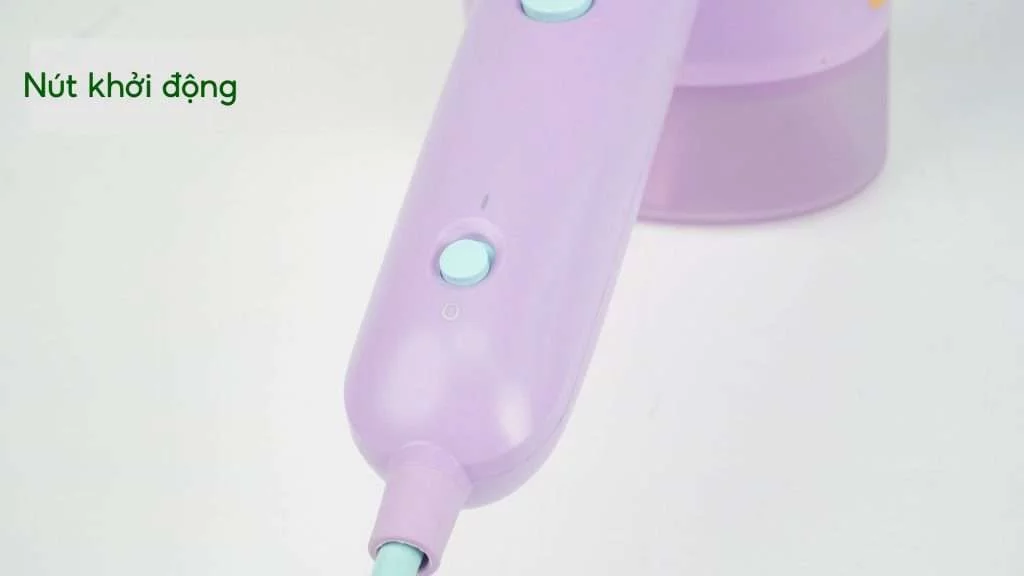 Bàn ủi hơi nước cầm tay Philips STH3010_30_Xanh dương đậm Nút khởi động