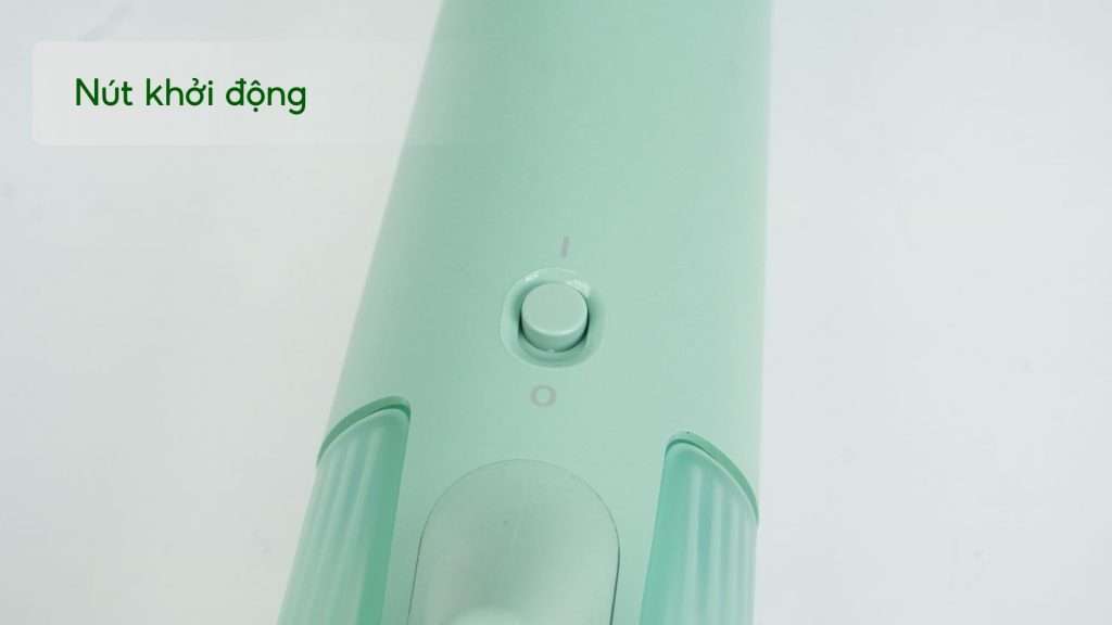 Bàn ủi hơi nước cầm tay Philips STH5010_70 Xanh ngọc Nút khởi động