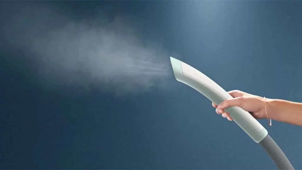 Bàn ủi hơi nước đứng Philips STE1010_70 - Hơi phun liên tục 32 g_phút